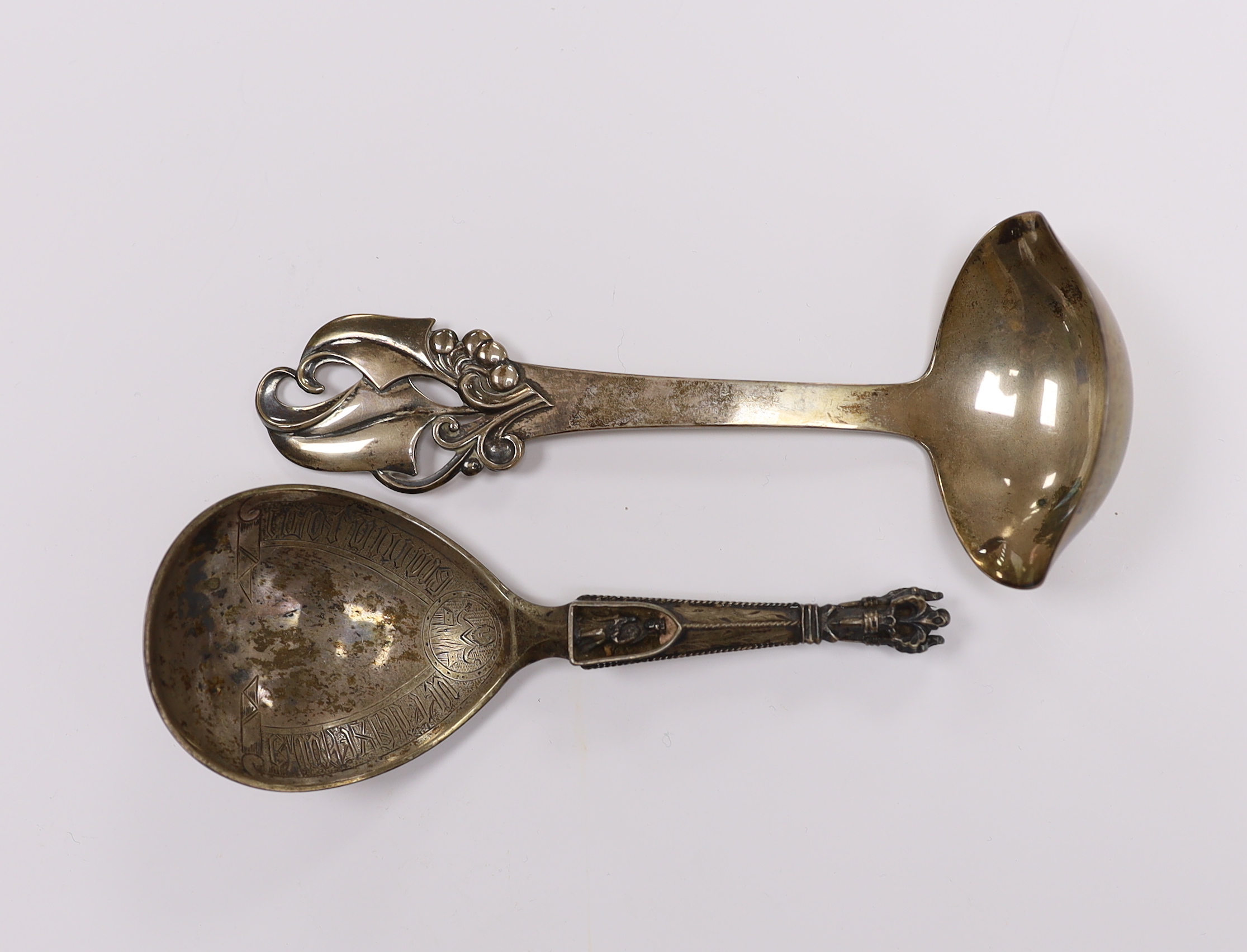 A Norwegian white metal spoon, by Marius Hammer, 15cm and a Danish white metal ladle.